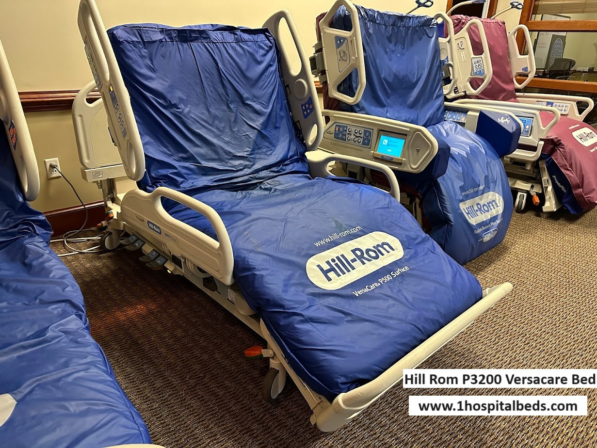 Hill Rom P3200 Versacare hospital bed with P500 air mattress system, featuring adjustable side rails and control panel.