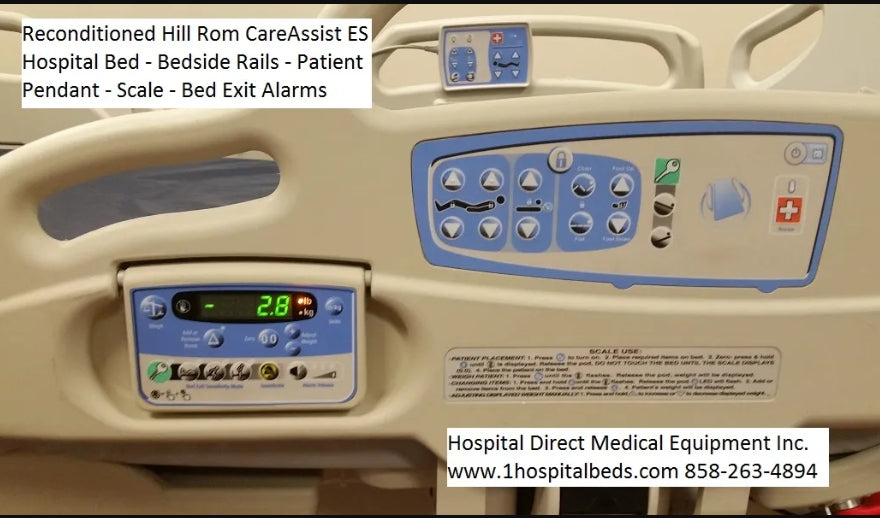 Close-up of a hospital bed control panel with various buttons and displays.