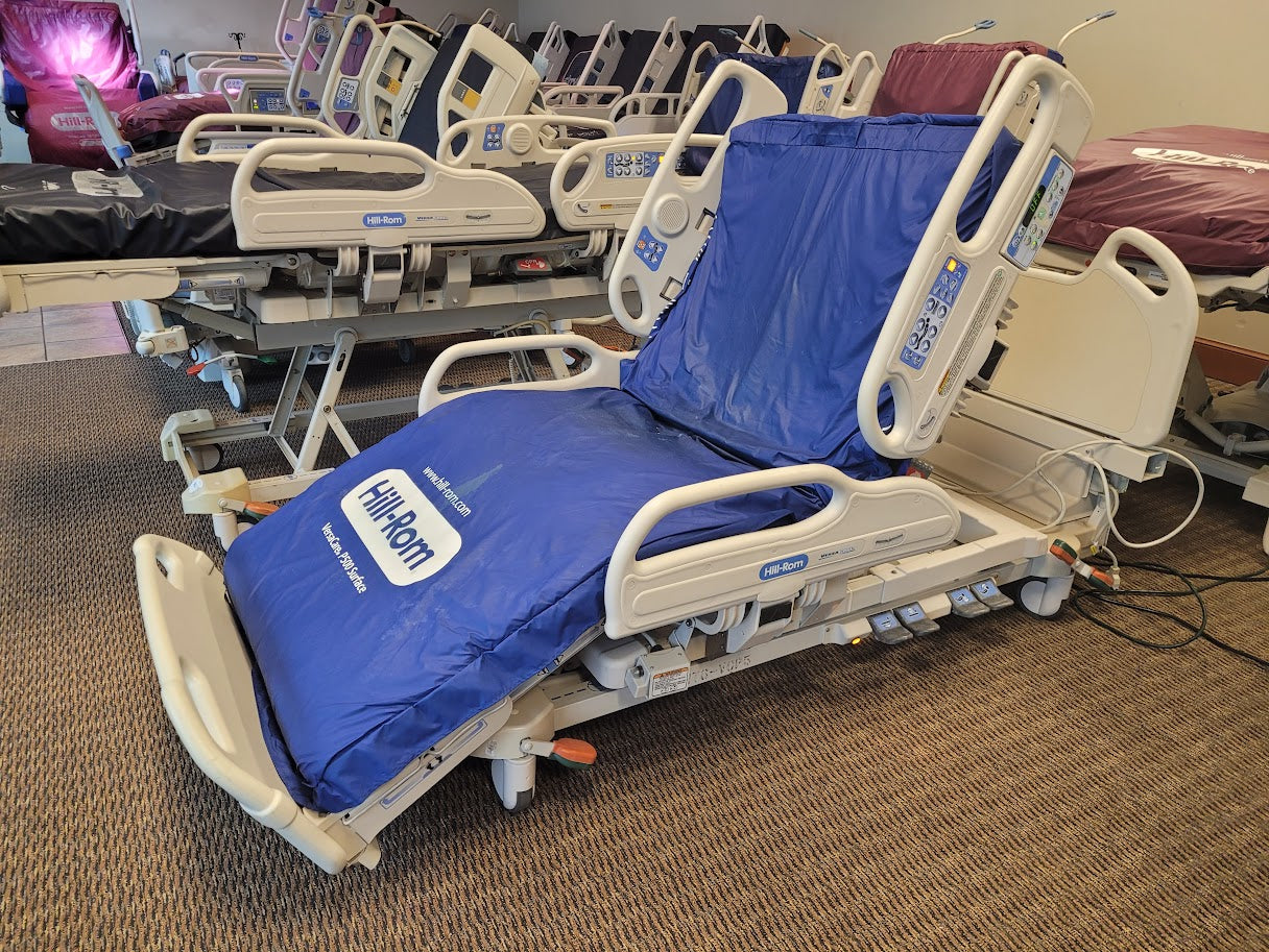 Hill Rom P3200 Versacare hospital bed with P500 air mattress system, featuring adjustable side rails and control panel.