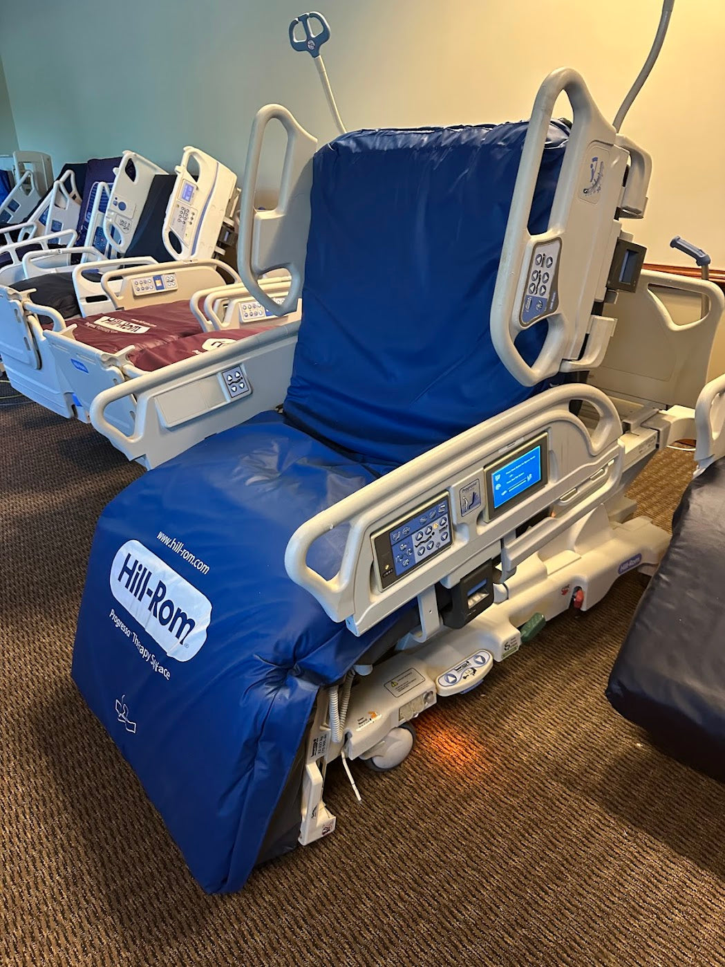 Hill Rom P7500 Progressa hospital bed with basic low air loss mattress, designed for patient comfort and pressure relief.