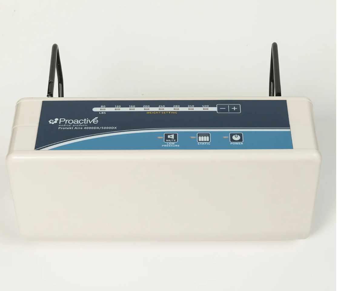 Image of the Protekt Aire 4600DX air mattress pump by Mr. Hospital Bed showing the control panel and air hose.