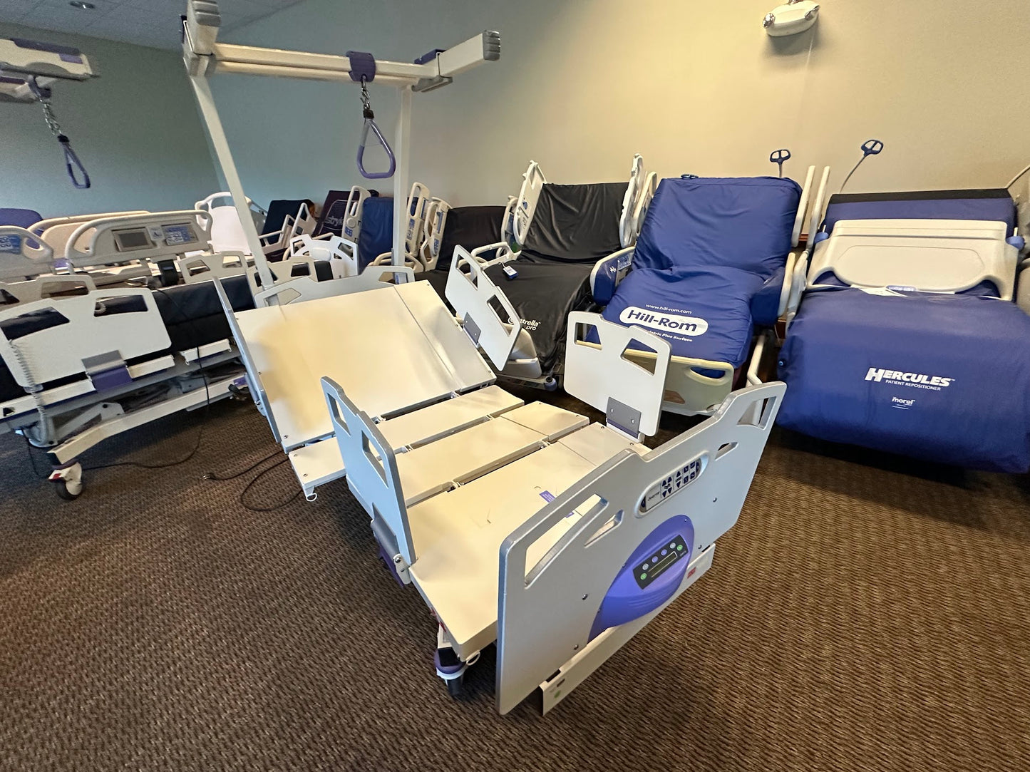 Extra-wide Stryker Joerns Bari10A bariatric hospital bed with adjustable side rails and sturdy frame for patient comfort and support