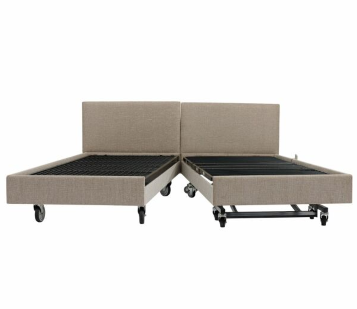 An adjustable bed frame with two separate upholstered headboard sections, shown in a light beige fabric with black metal slats and casters on a white background.